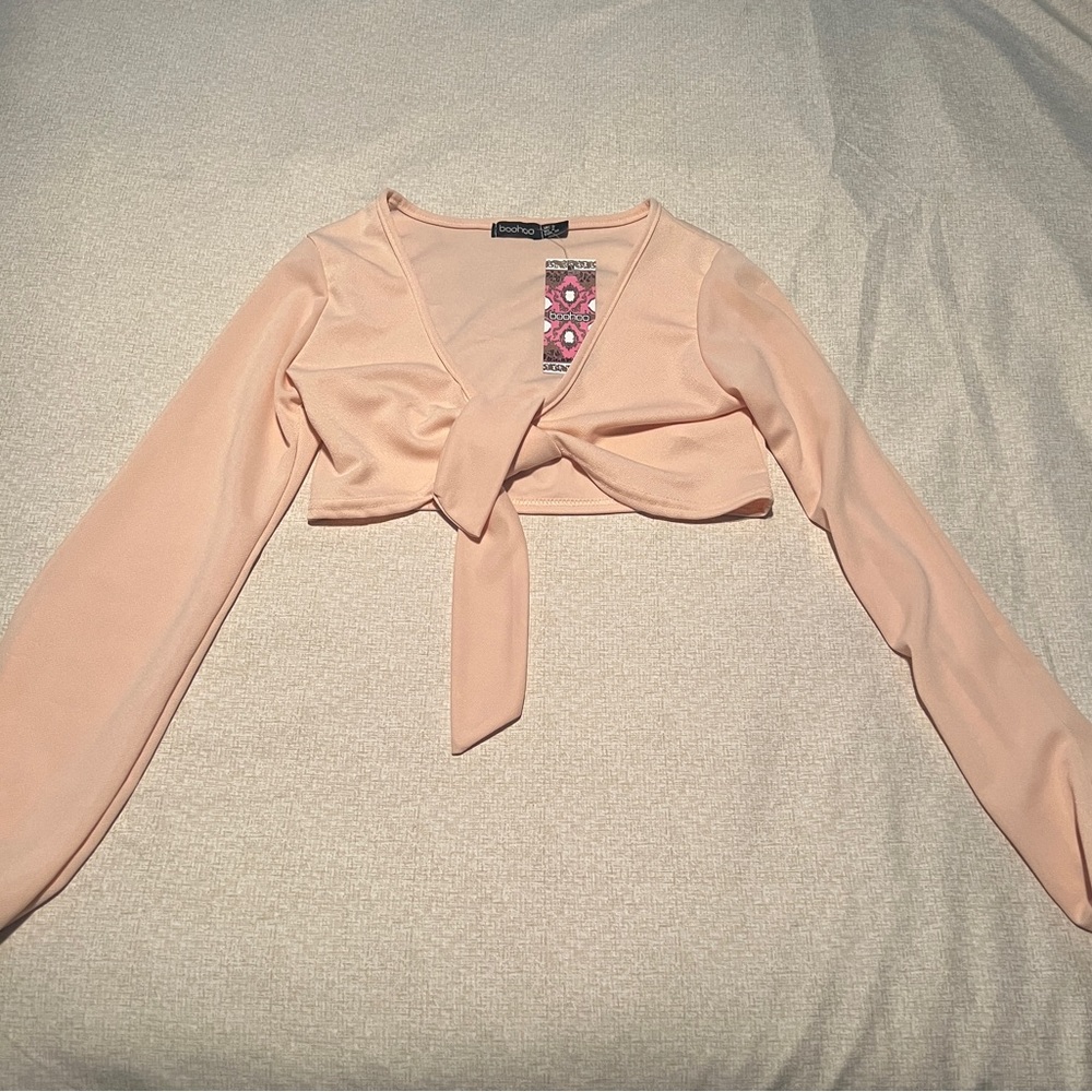 Tie in front cropped long sleeve blouse